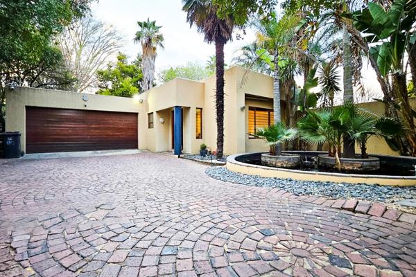 A Tropical Oasis awaits you when you step inside this gem of a home in Sundowner.

Stepping inside, you are greeted with warm modern ...