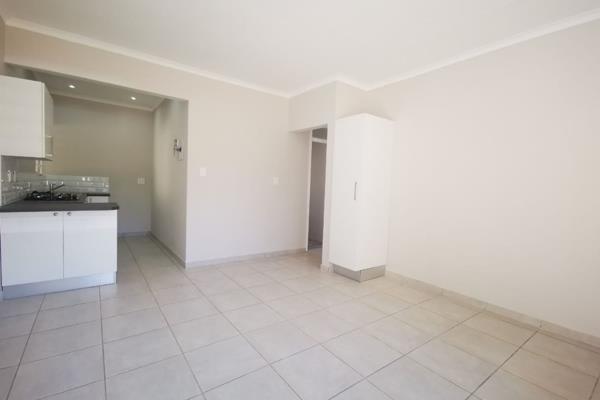 Modern 2 bedroom garden unit, with quality finishes, in a quiet boomed off area. 

Open plan kitchen and living room. The sliding door ...