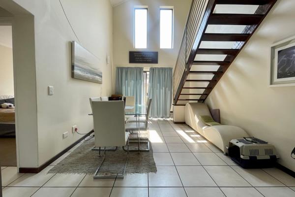 This stylish 1-bedroom, 1-bathroom loft apartment offers modern living with ample space ...