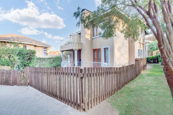 This ground floor apartment in Paulshof has a fenced off garden with a patio and built in braai.

The main bedroom has doors that open ...