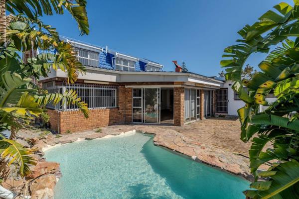 Welcome to your new home in the tranquil neighbourhood of Kenwyn, Cape Town. This inviting double-story property offers six bedrooms ...