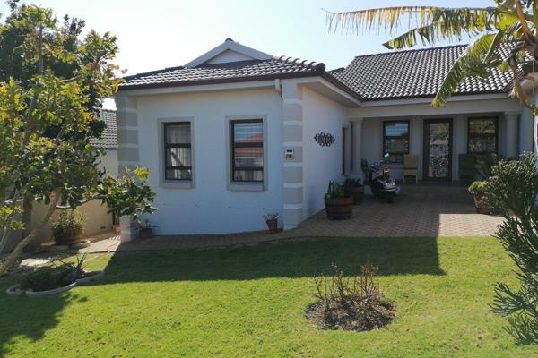 Nestled within the prestigious Monte Christo security estate in the charming town of Hartenbos, this modern residence offers a ...