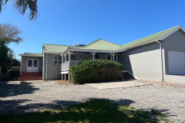 Situated in a quiet cul-de-sac, within walking distance from the Langebaan ...