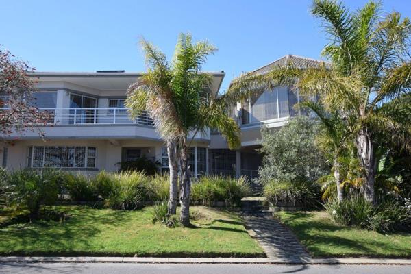 This timeless classical home in the sought-after suburb of Plattekloof offers breathtaking 180&#176; views and a versatile two-story ...