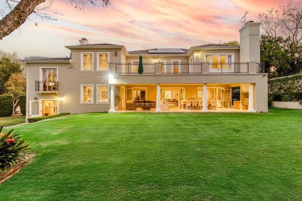 Nestled in an upmarket estate in Bryanston East with 24-hour security, this north-facing, classical architectural designed home offers ...