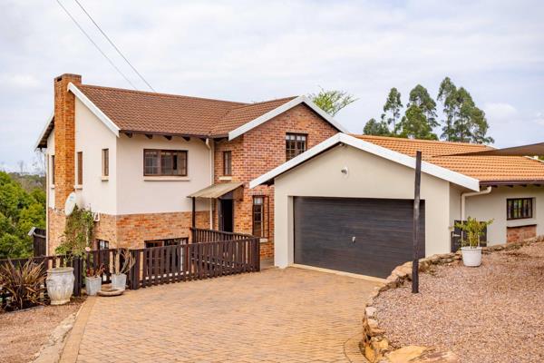 This charming multi-level home, with its rustic brick fa&#231;ade and neutral tones ...