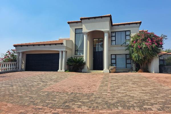 Welcome to this exquisite 4-bedroom double-storey family home located in an upmarket ...