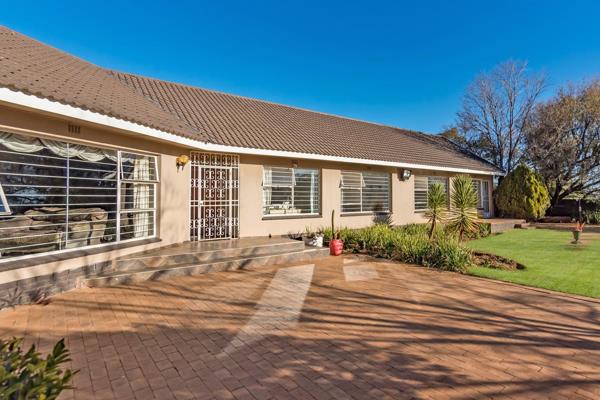 Nestled in the vibrant heart of Greenhills Randfontein , this charming and well maintained residence presents a haven of comfort and ...