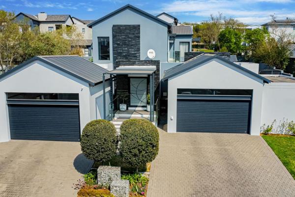 Welcome to the prestigious Helderfontein Eco Estate, where modern living meets nature&#39;s tranquility. This exquisite 4-bedroom home ...