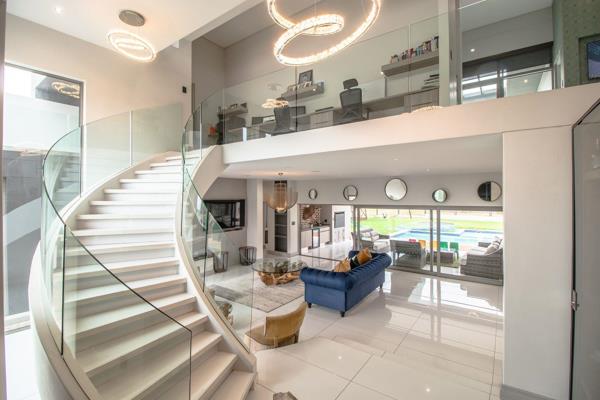 Sole and Exclusive

Stunning Modern Architectural Home in Secure Estate Bordering a Beautiful Park.

Overview: Discover a harmonious blend of contemporary design and luxurious living in this bright and airy home, perfectly situated in a secure estate. With easy lines and an ...