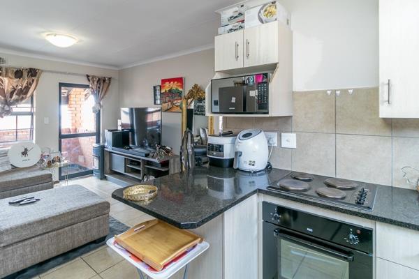 This apartment at San Ridge Heights is available for sale.

The apartment opens up to an open plan kitchen equipped with built-in ...