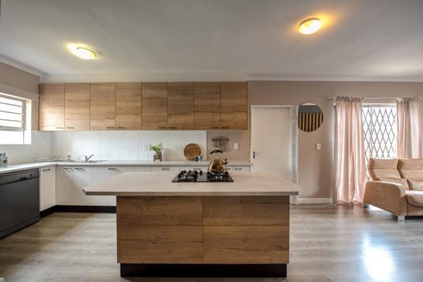 Modern 3-bedroom house in Vredelust, Kuils River features a sleek and clean kitchen, ideal for both casual and formal cooking. 

The ...