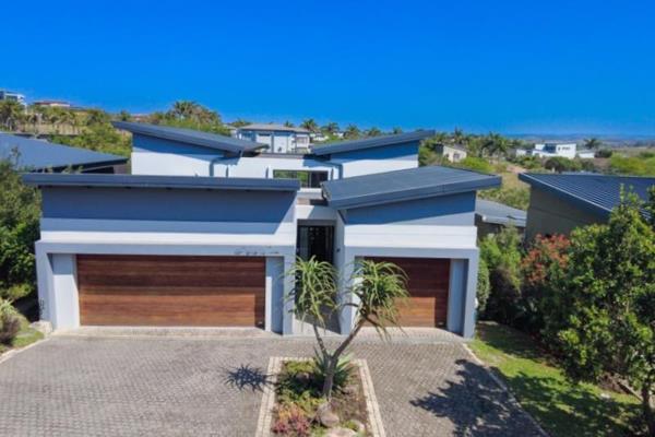 PALM LAKES ESTATE offers this split-level double-storey home available for sale.

The home offers a stunning entrance hall with a steel ...