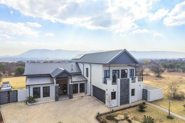 Immerse yourself in the tranquil beauty of the La Camargue Estate with this exquisite 4-bedroom home.


The open-plan layout features ...