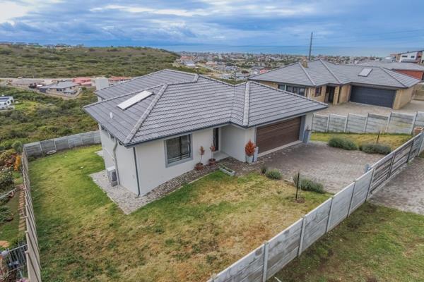 This stunning stand-alone home boasts breathtaking sea and mountain views. The property ...