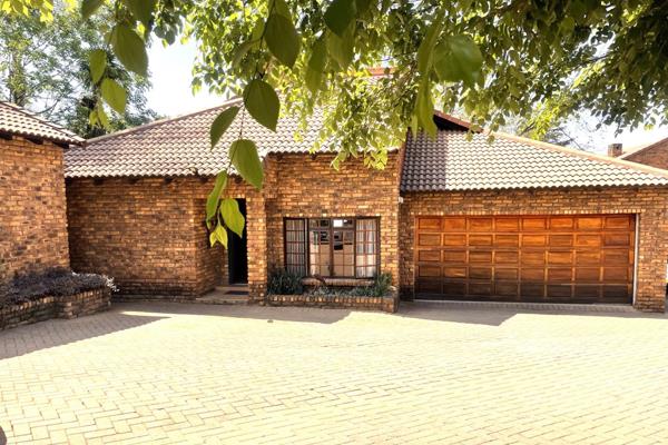 Presenting this elegant townhouse, where comfort meets sophistication! Freshly painted inside and out, with all wooden frames ...