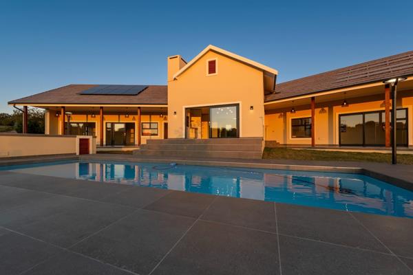 This newly constructed home is a stunning blend of modern design and luxury, perfect for ...