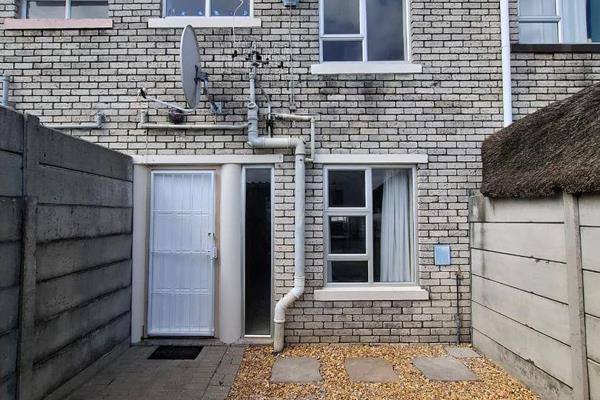 This 2-bedroom duplex offers comfortable living with both bedrooms featuring built-in ...