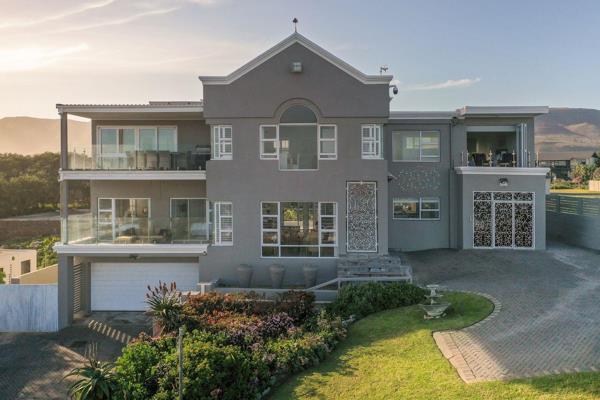 Team Coetzee Sole &amp; Exclusive Mandate

Nestled just steps away from the sandy shores of Sandbaai, Hermanus, this exquisite ...