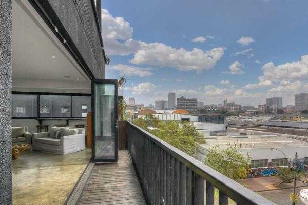 This sleek, industrial-style penthouse offers the perfect blend of modern design and urban convenience, ideal for city dwellers. The ...