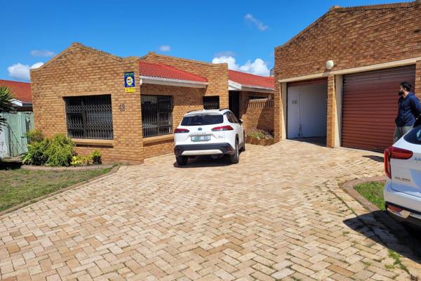 Large family face brick home, open plan kitchen with gas hob,, Study and double garage has sliding door to sparkling pool area for ...