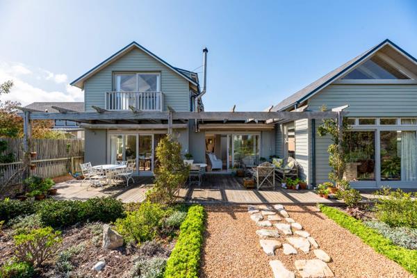 Welcome to  this  stunning home nestled within a beautifully landscaped, water-wise, indigenous garden. 

This tranquil retreat ...