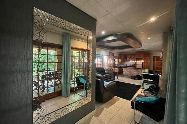 Chipembere Executive Suite, a TGCSA-graded four-star, exclusive, self-
catering,100 square meter, fully furnished apartment located in ...