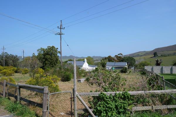 This vacant stand is fenced around and fairly even. It has a central location with basic ...