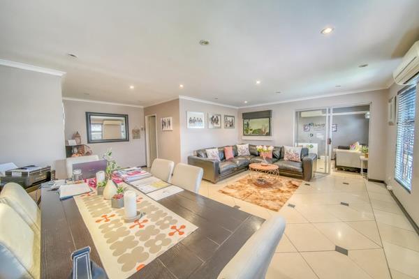 This spacious 3-bedroom, 3-bathroom home in the peaceful suburb of Fairways, Cape Town ...