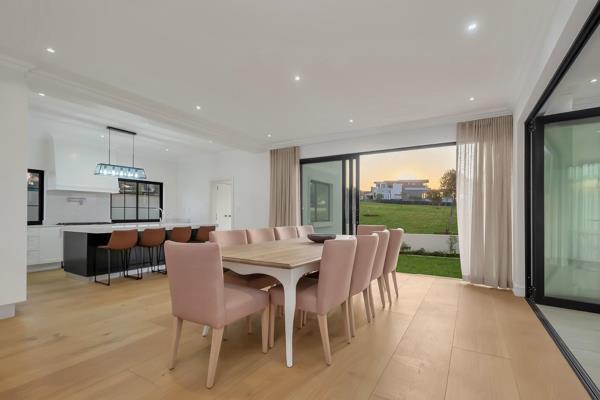 This beautifully designed modern classic home perfectly blends luxury and elegance. With four spacious bedrooms, each with its own en-suite bathroom, this home is ideal for a family seeking comfort and style. The property ...