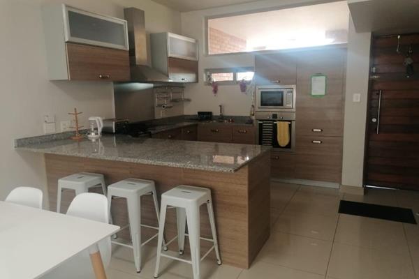 This Apartment consists of 2 bedrooms and 1 full bathroom.  The kitchen includes a washing machine, dishwasher, fridge and freezer ...