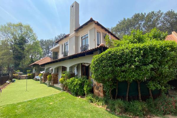 Lovely Family Home with Picturesque Views!

Situated in Upmarket Estate with serene golf course!

Downstairs:

- Big veranda with ...