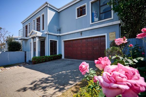 Step into elegance with this stunningly appointed residence, featuring a grand tiled entrance hall that leads to a generous living ...