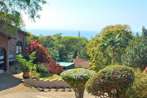 This lovely home with sea views is situated in large park like gardens and offers three ...