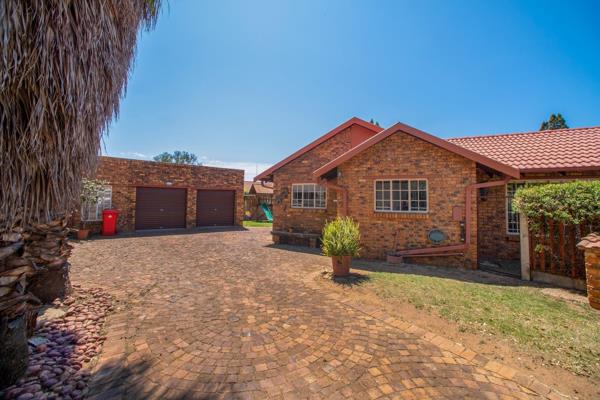 Welcome to this stunning four-bedroom, two-bathroom family home located in a secure gated community. This property boasts a spacious ...