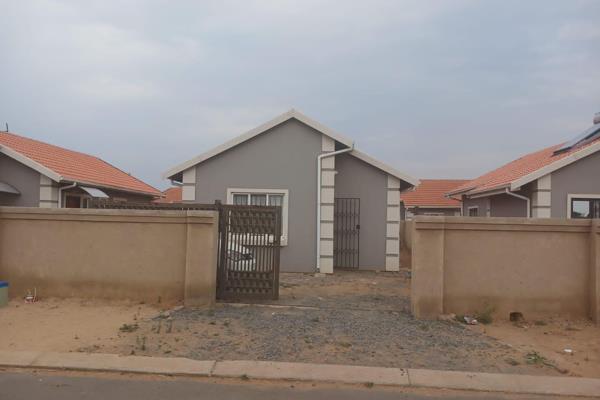 2 bedroom house lounge build in kitchen separate toilet bathroom wall and gate with 24 hours security.