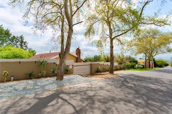 Well maintained three-bedroom home boasts two bathrooms and a spacious double garage, complete with an electric gate and remote-controlled garage door for added convenience. The open-plan design seamlessly combines the kitchen ...