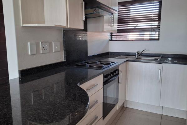 Spacious tiled throughout and modern 3 Bedroom apartment with 2 bathrooms..

Large living areas opening onto balcony with built in ...