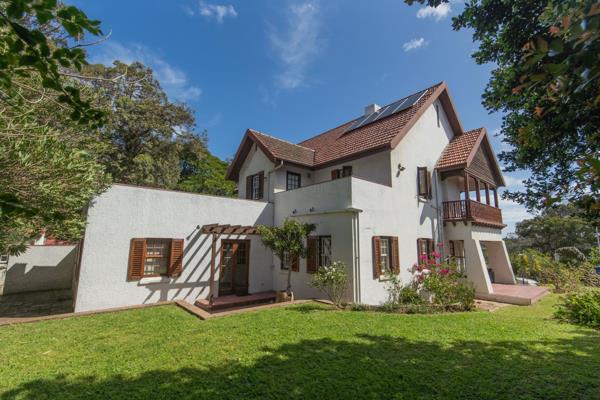 Welcome to this charming Colonial Revival-inspired home, nestled in a serene and ...