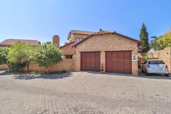 The property offers a double garage plus communal parking areas for guests, and a ...