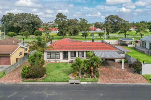 This beautifully designed 4-bedroom, 3-bathroom family home boasts exceptional curb ...