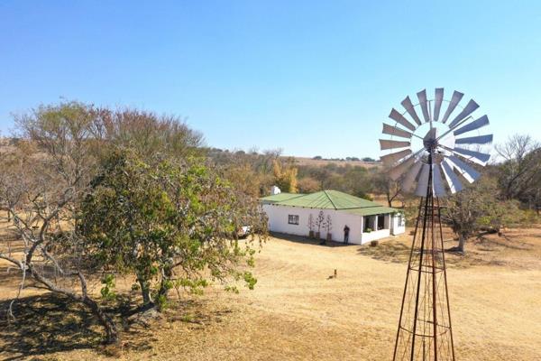 Welcome to a stunning 500-hectare farm that perfectly blends agricultural potential with breathtaking natural beauty, located just 30 ...