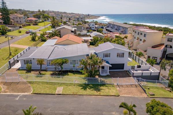 Located in Uvongo, this recently revamped beach house offers modern living with all the ...