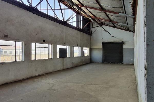 This unit is an allocated section of a larger factory, offering a wide scope of usage potential within an industrial-zoned premise. ...