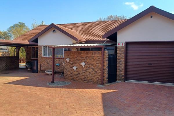 This three bedroom home with two bathrooms, lock up garage, kitchen court, carport ...