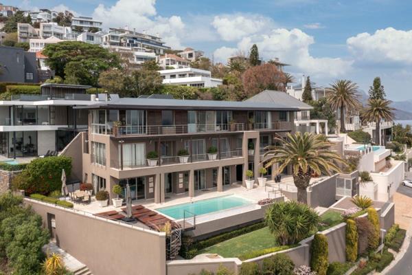 Panoramic views towards Robben Island and beyond, this iconic home is situated stone’s throw from Ellerman House offering super ...