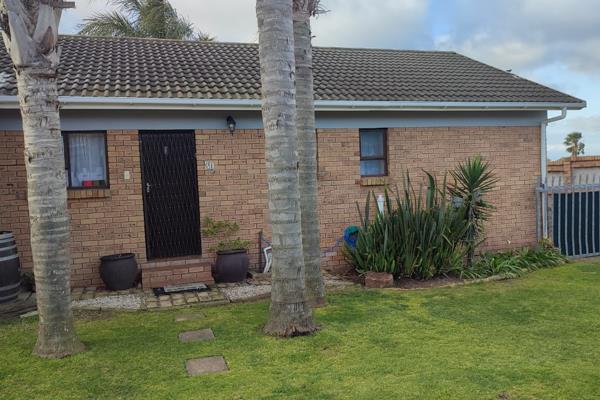 Single level house with an open plan living area and kitchen plus a pleasant undercover ...