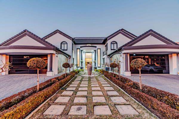 View by Appointment: The luxurious grand entrance of this majestic home invites you to the living areas, all facing the golf course and ...