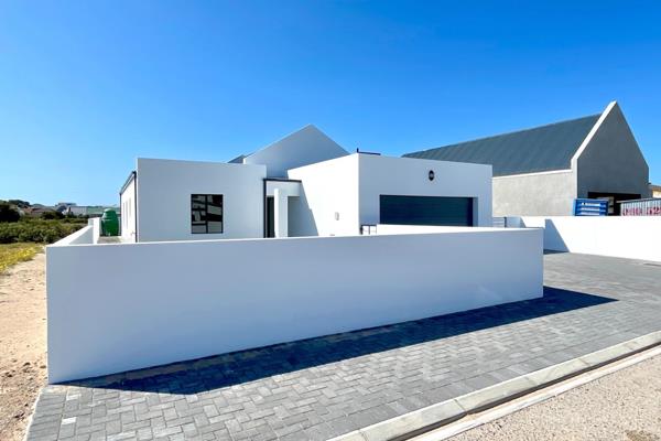 This stunning 3-bedroom home is ideally situated in the sought-after Britannia Ocean Estate, St Helena Bay. Perfect for permanent living or a relaxing getaway, this property offers a spacious 212m2 floor plan and a generously ...