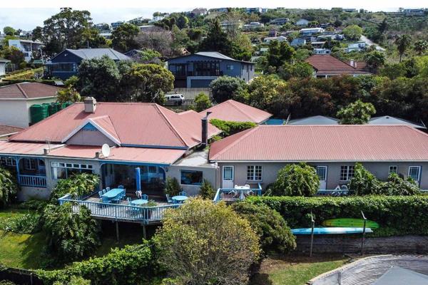 This extraordinary urban farmhouse near Knysna offers a rare investment opportunity with vintage charm and business potential. Built in ...